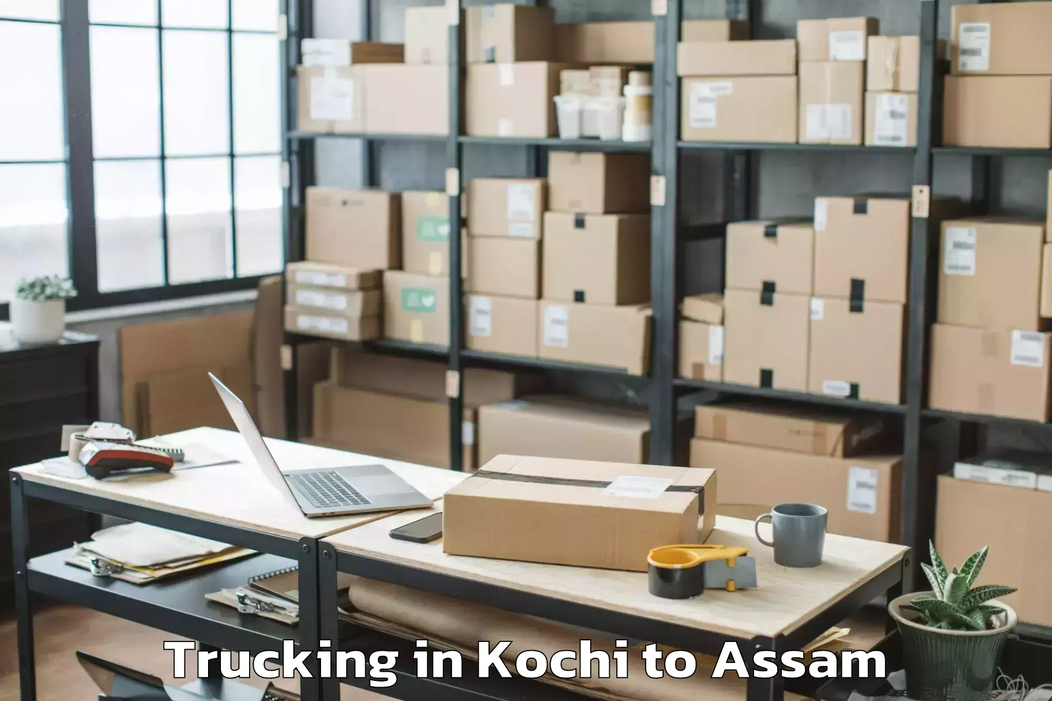 Trusted Kochi to Raha Gaon Trucking